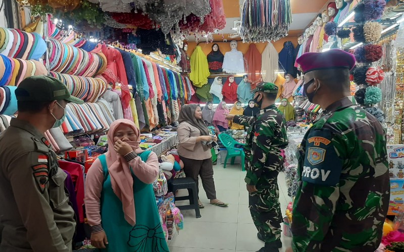  Satgas Covid-19 Patroli Prokes di Pasar Bambu Kuning