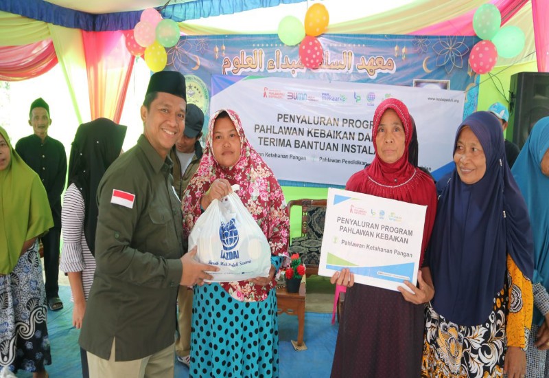  LAZDAI Lampung Salurkan Bantuan Bahan Pokok di Desa Cilimus Teluk Pandan Pesawaran