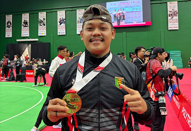  Mahasiswa Universitas Teknokrat Indonesia Rizki Andika Irawan Raih Emas Pencak Silat PON Bela Diri